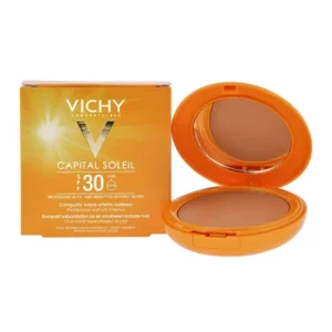 Maquillaje Vichy compacto Capital soleil foto de su caja donde se ve un sol y las V de vichy y el maquillaje compacto de vichy en su aplicador con espejo